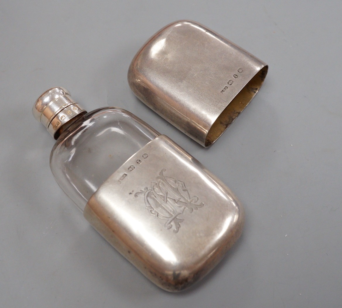 A late Victorian silver cased glass hip flask, Edward Osborn Marples, Birmingham, 1897, 10.8cm.